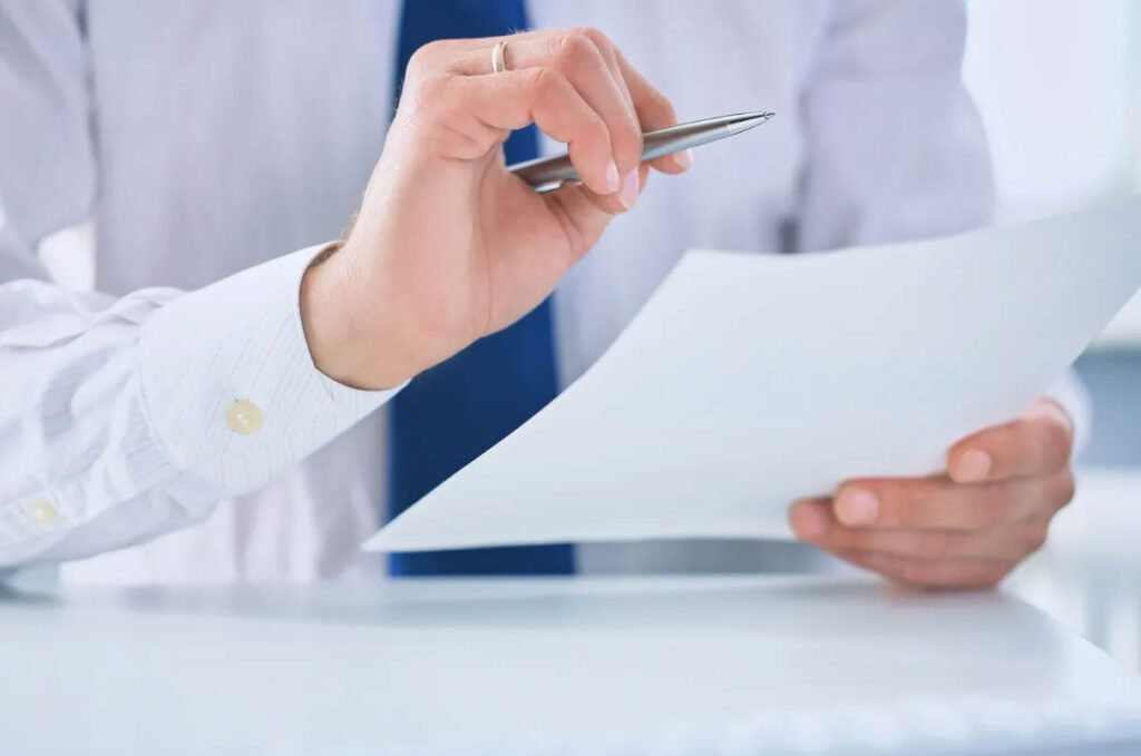 Person reviewing paperwork
